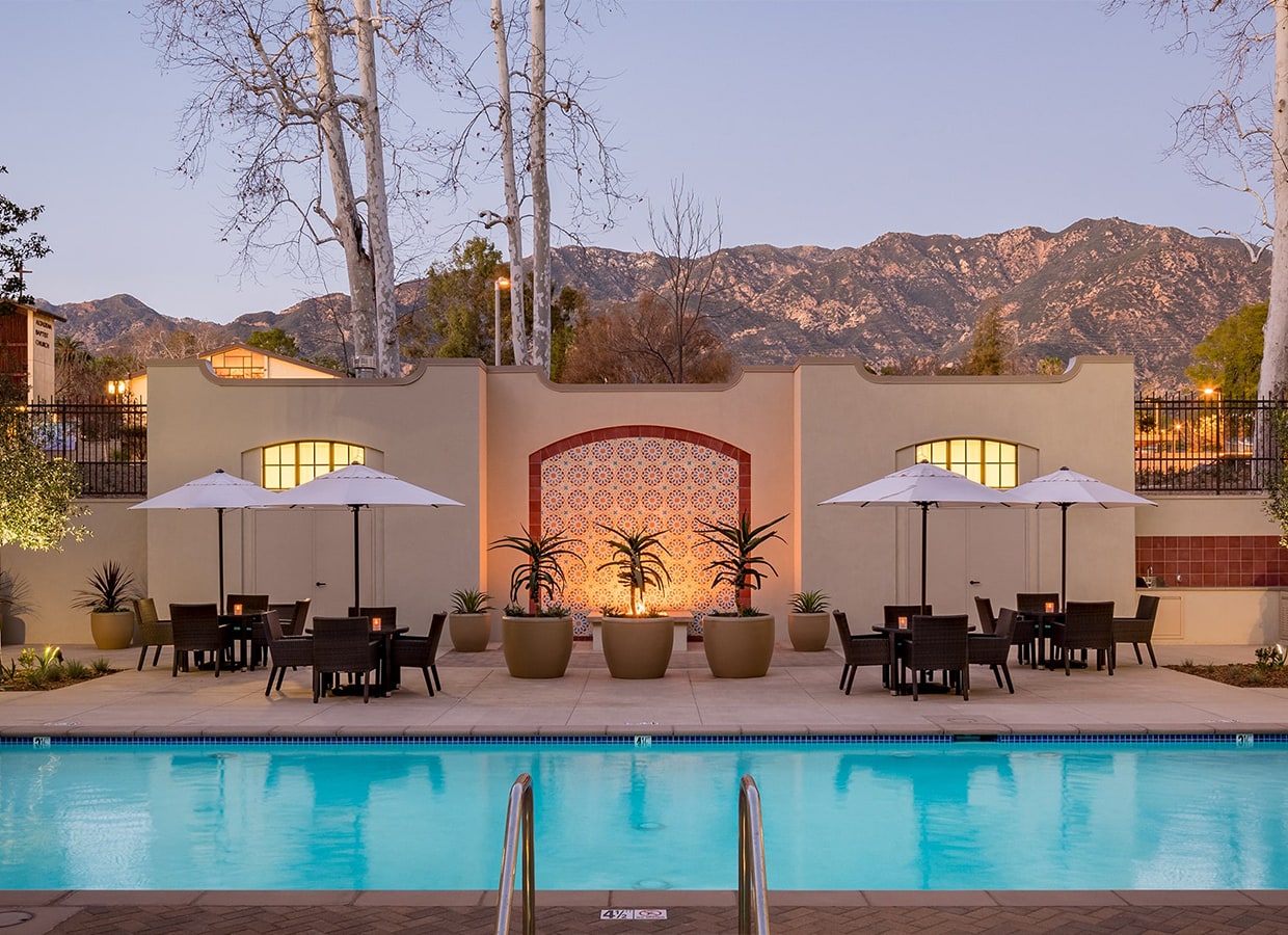 Serene swimming pool at dusk exemplifies luxury senior living in Pasadena
