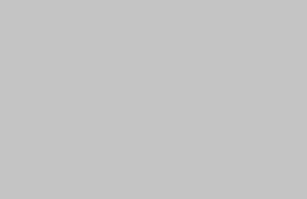 A plain, solid light gray square with no visible objects, patterns, or text.