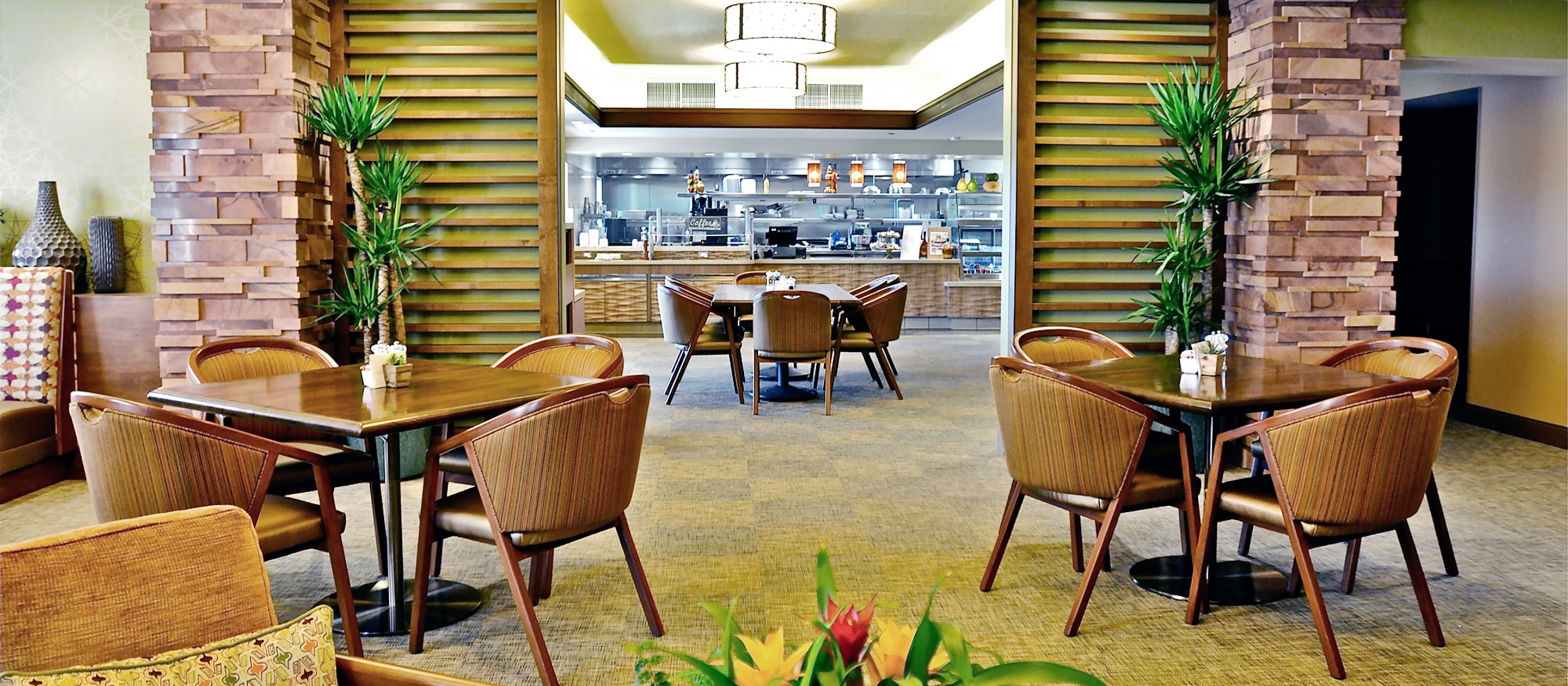 Comfortable and modern dining room at the Covington, one of ECS's retirement communities in Orange County