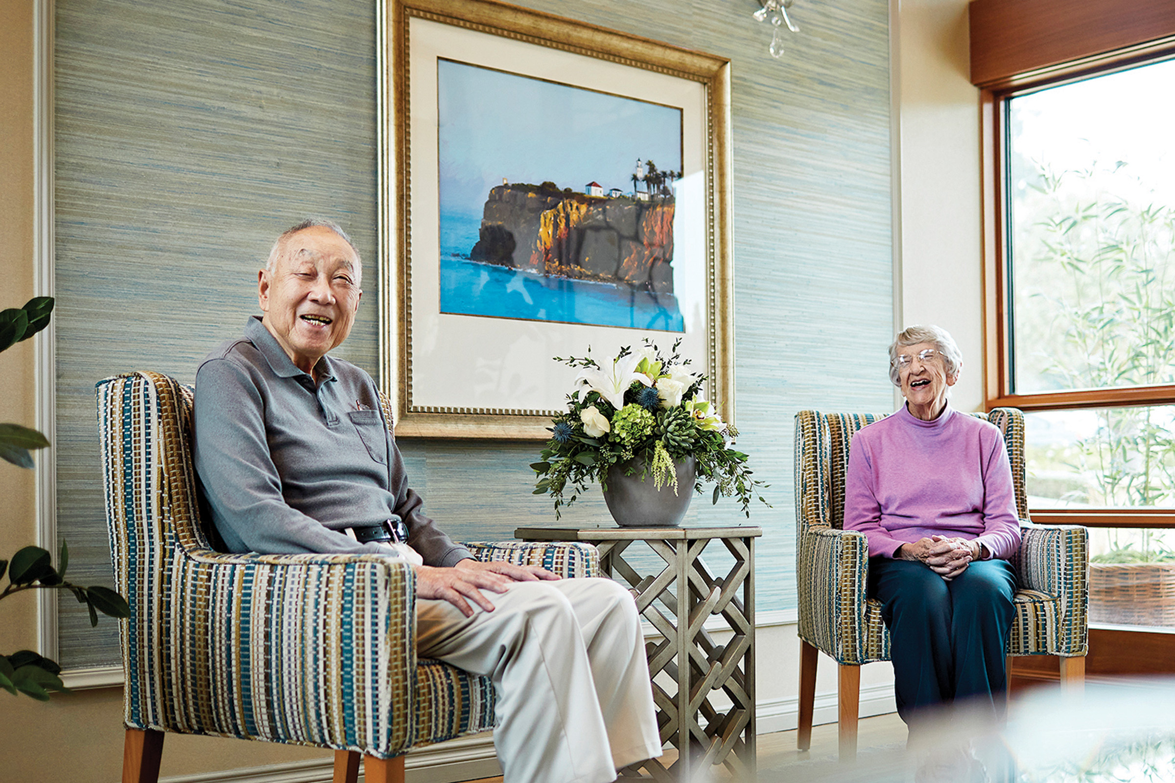 Two smiling seniors enjoy independent living in Los Angeles at the Canterbury.