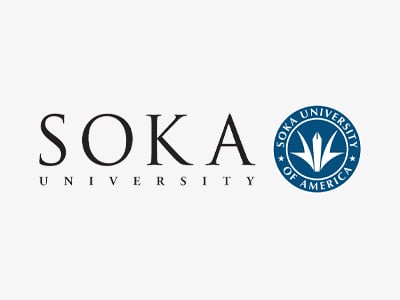 Soka University logo with “Soka University” in black text and a blue circular emblem on the right featuring the words “Soka University of America” and a white abstract symbol in the center.