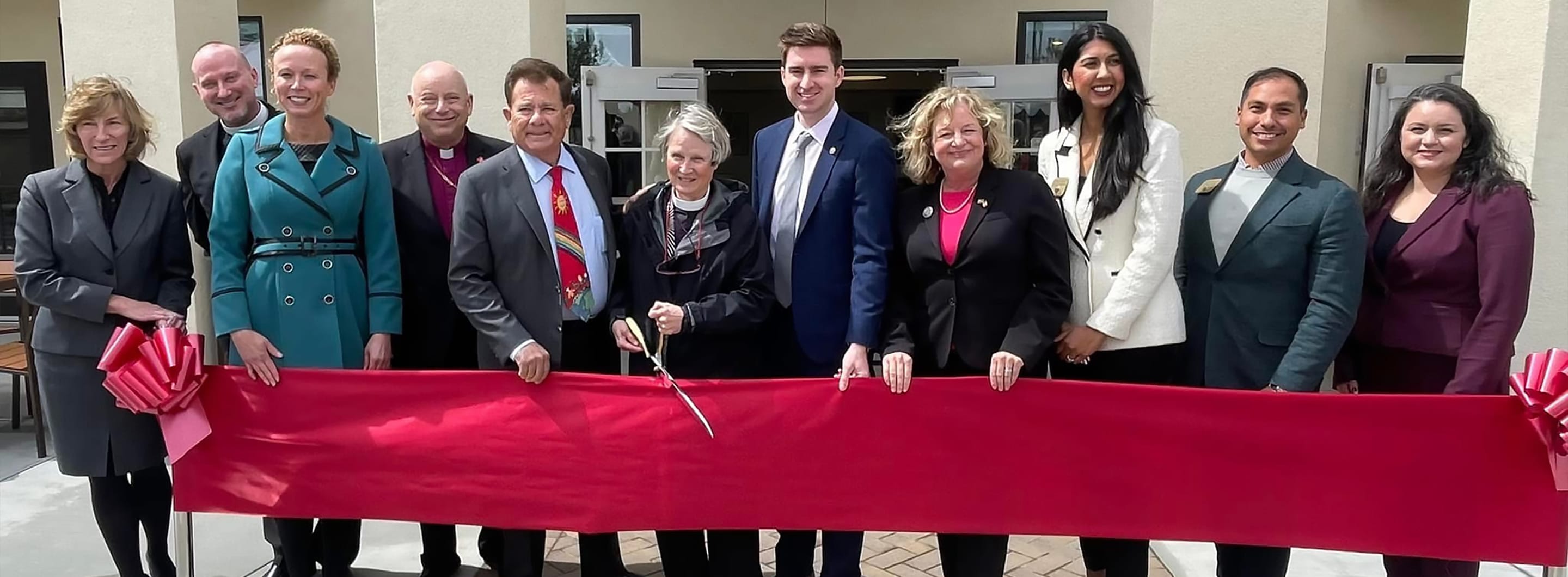 Episcopal Diocese of Los Angeles cutting ribbon for grand opening