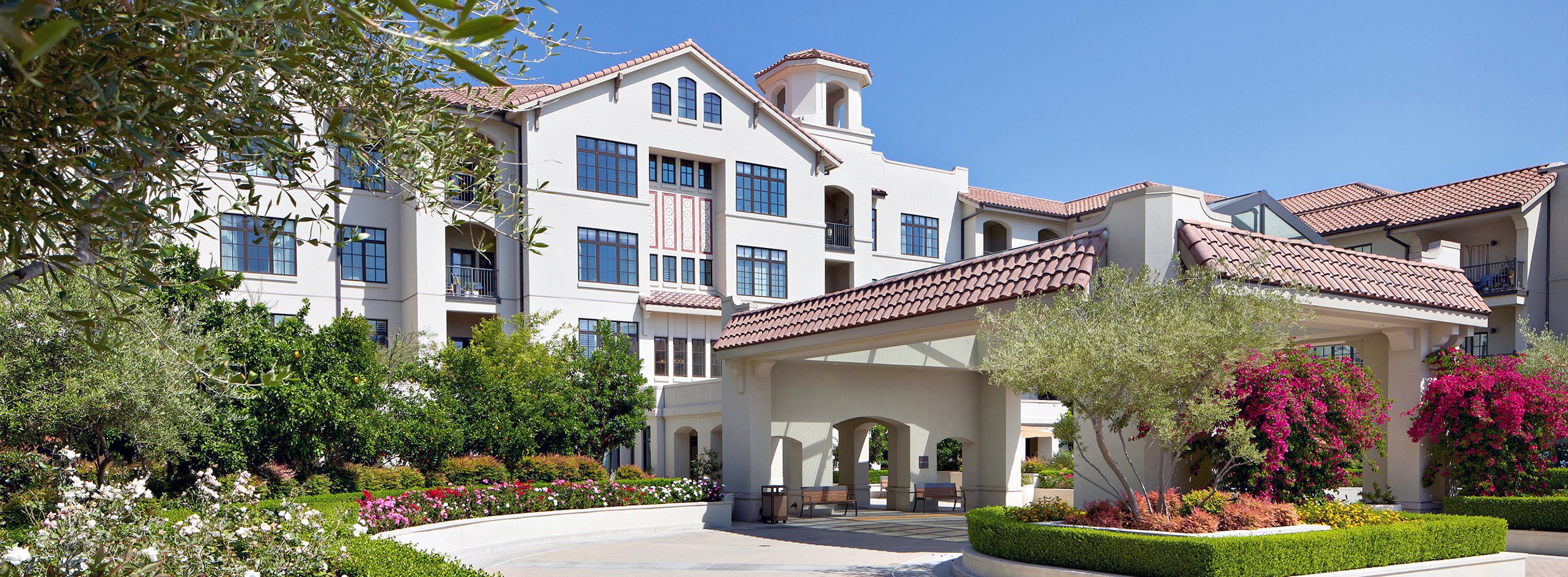 Exterior view of senior living community in the afternoon