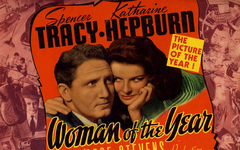 Vintage movie poster for Woman of the Year featuring illustrated close-ups of a man and woman, with bold text displaying Spencer Tracy, Katharine Hepburn and The Picture of the Year!.